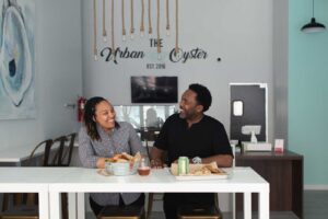 Jasmine Norton and her father at The Urban Oyster by Becky Stavely
